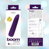 Image of a purple VeDO Boom Rechargeable Warming Bullet Vibrator in its packaging. The front of the box highlights features like "10 vibration modes," "6 intensity levels," and "pulsating pleasure." The back offers product details and usage instructions for this waterproof, submersible delight.